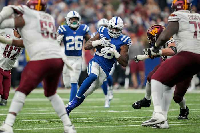 Oct 30, 2022; Indianapolis, Indiana, USA; Indianapolis Colts linebacker Shaquille Leonard (53) rushes the ball after intercepting a pass by Washington Commanders quarterback Taylor Heinicke (4) on Sunday, Oct. 30, 2022, during a game against the Washington Commanders at Indianapolis Colts at Lucas Oil Stadium in Indianapolis.